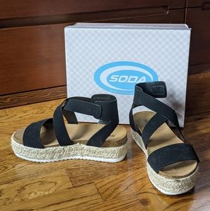 Platform sandals by Soda